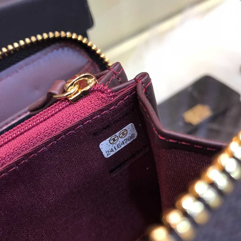 Ch*el gusset zip around wallet quilted caviar golden-tone large black