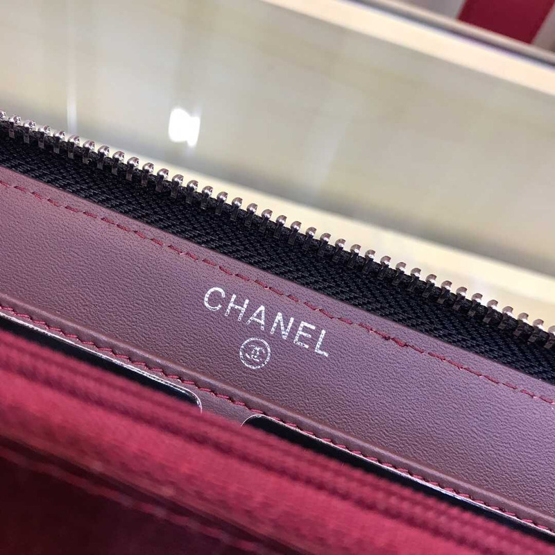 Ch*el gusset zip around wallet quilted caviar silver-tone large black