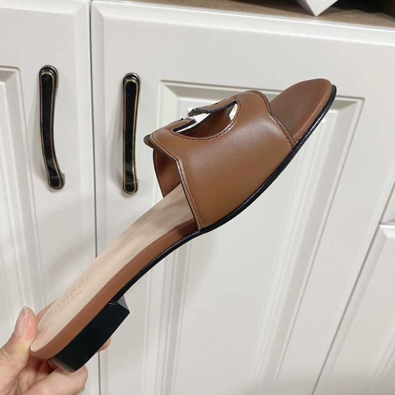 G*u*i women`s interlocking g cut-out slides sandal