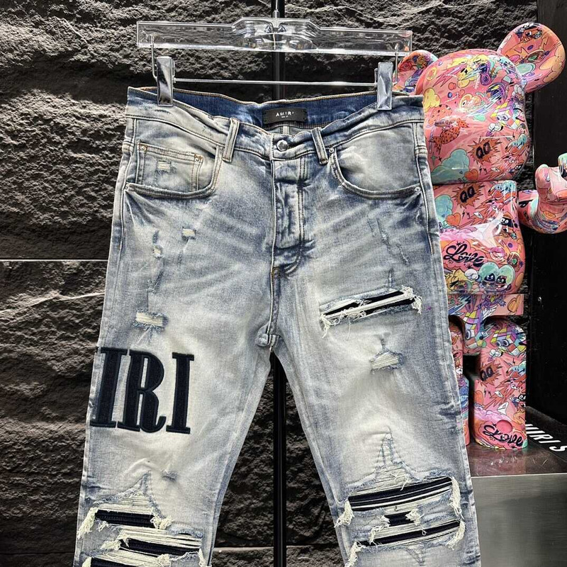 Amiri Logo Distressed Skinny Jeans Blue