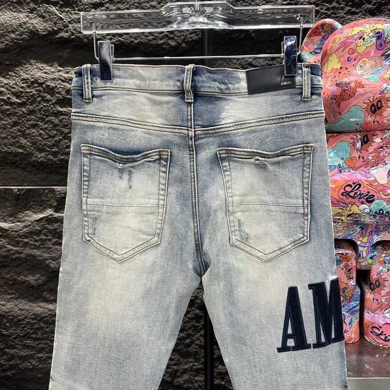 Amiri Logo Distressed Skinny Jeans Blue