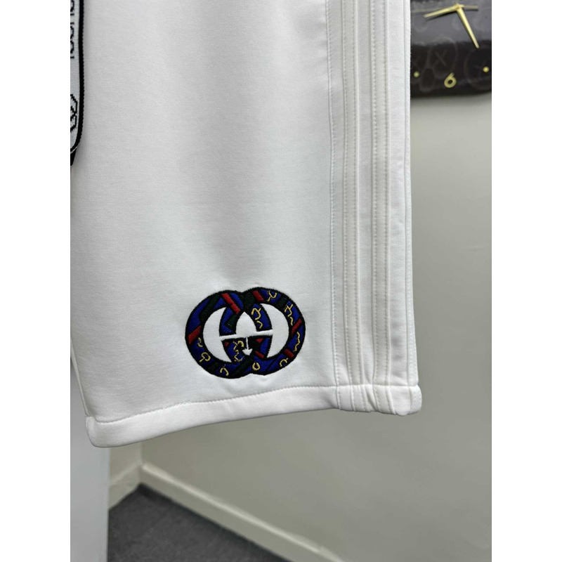 G*u*i logo-print shorts in white