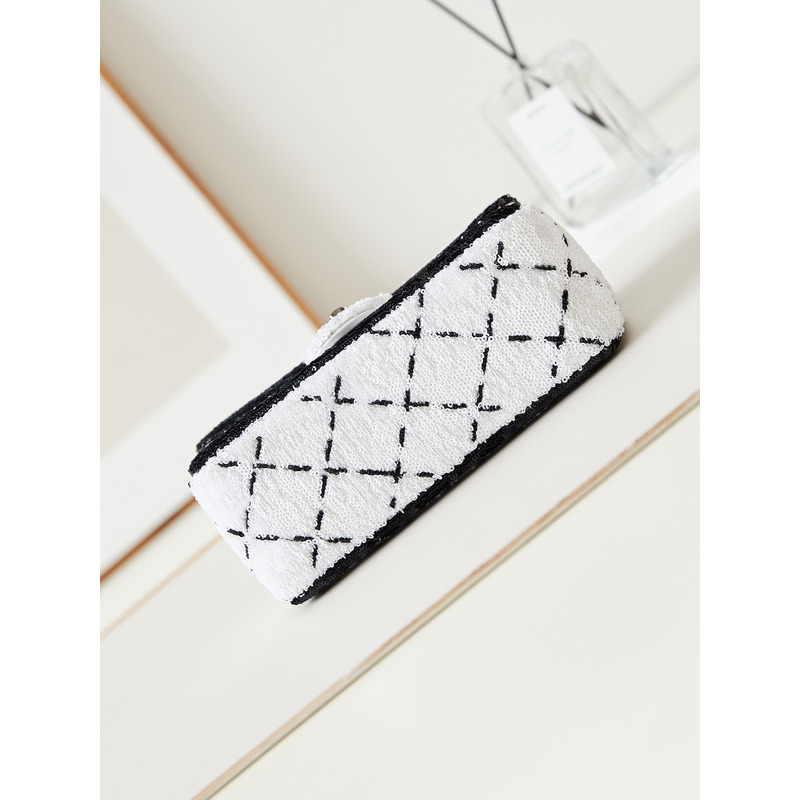 Ch*el large palatine capsule sequins & gold metal white and black