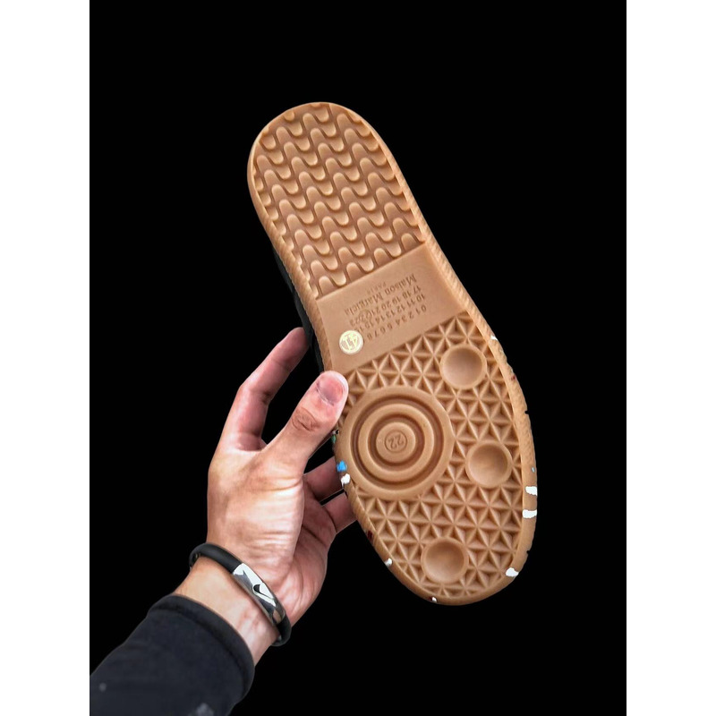 ma*s*n Ma*i*la paint drop sneakers black