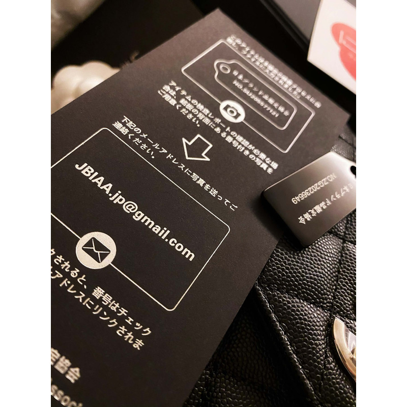 Ch*el  flap bag with handle grained calfskin & gold-tone metal black