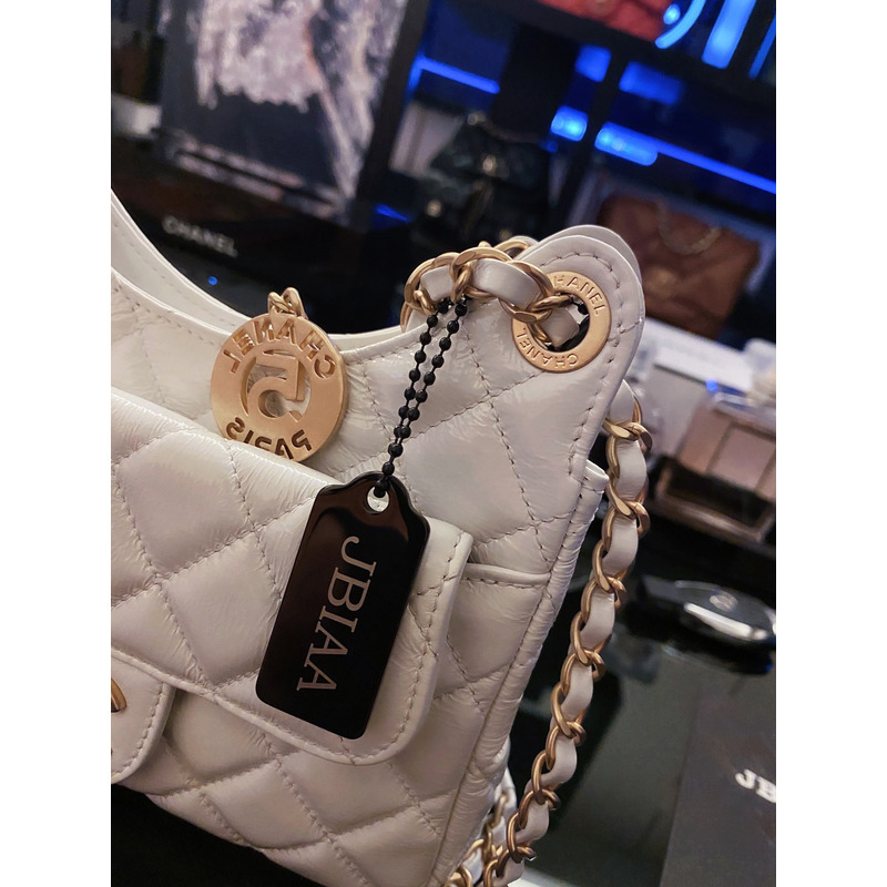 Ch*el shiny crumpled calfskin & gold-tone metal pink