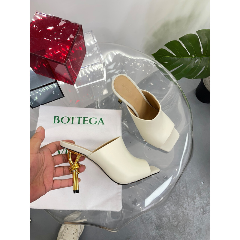 Bo*te*ga ve*ne*ta knot mule with gold finished metal knot heel beige