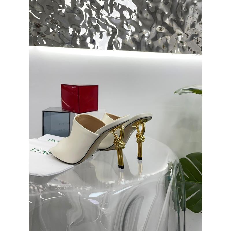 Bo*te*ga ve*ne*ta knot mule with gold finished metal knot heel beige