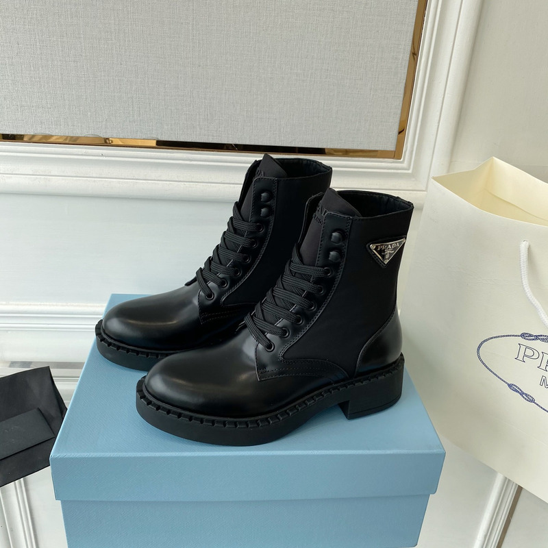 Pra*a brushed-leather and re-nylon boots black