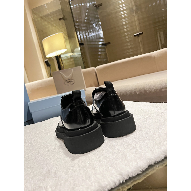 Pra*a triangle-logo brushed leather derby shoes black