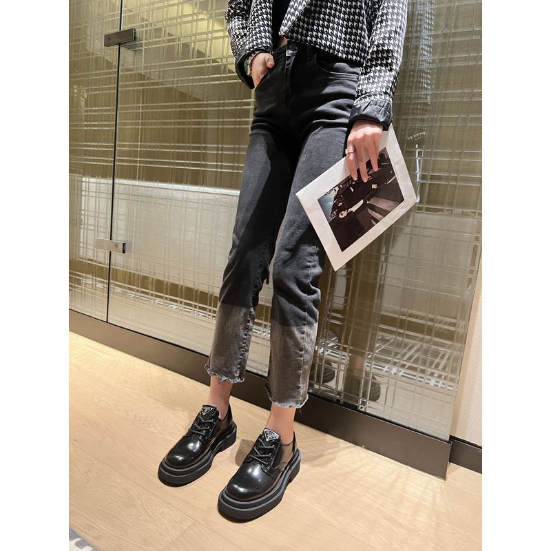 Pra*a triangle-logo brushed leather derby shoes black