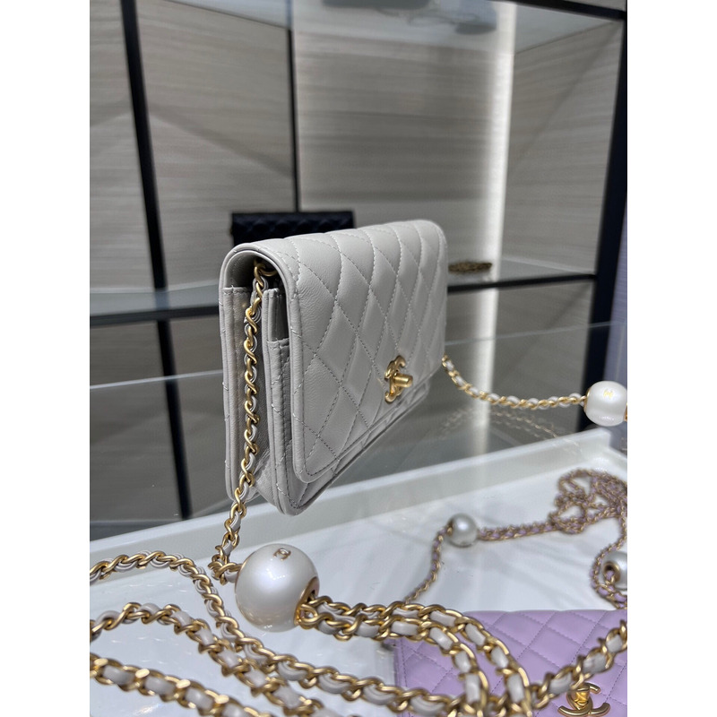 Ch*el lambskin, imitation pearls & gold metal in white