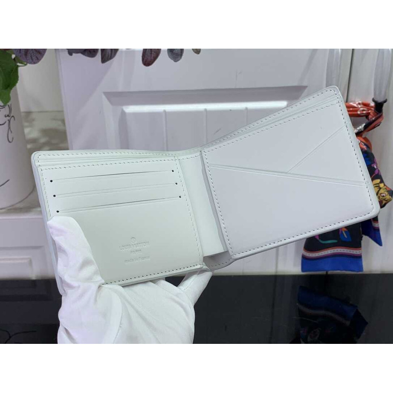 l**is V*t*n multiple wallet monogram shadow white