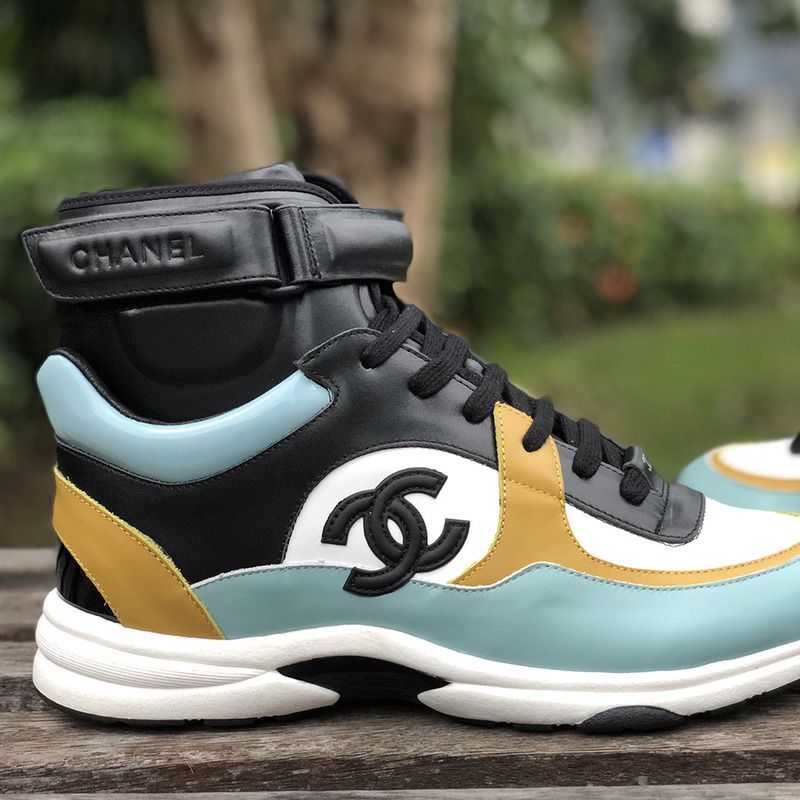 Ch*el calfskin & velvet high top sneaker inblack, light yellow, white & light blue