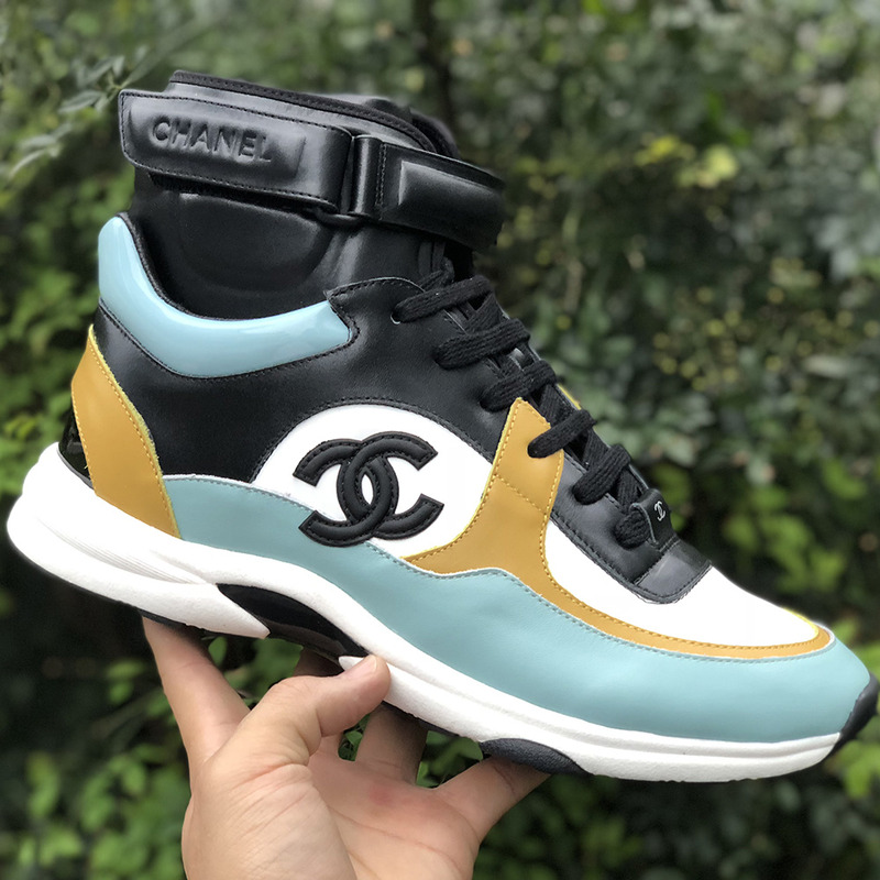 Ch*el calfskin & velvet high top sneaker inblack, light yellow, white & light blue