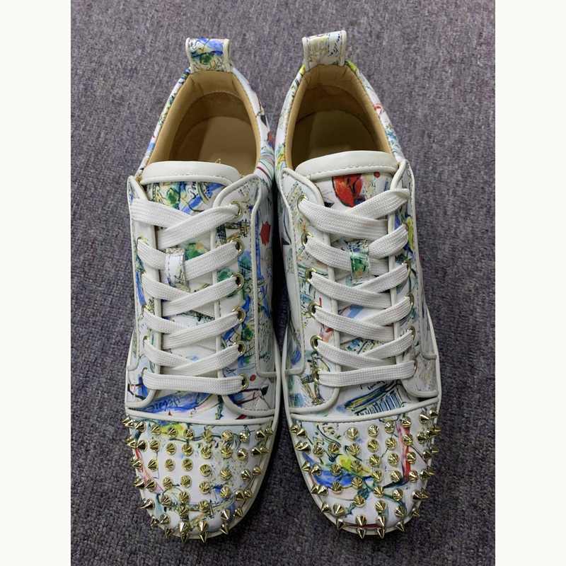 ch**an louboutin S*per perfect l**is junior spikes trainers