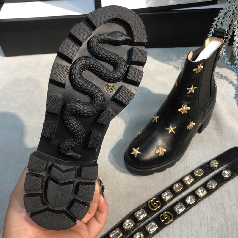 G*u*i embroidered leather ankle boot with belt