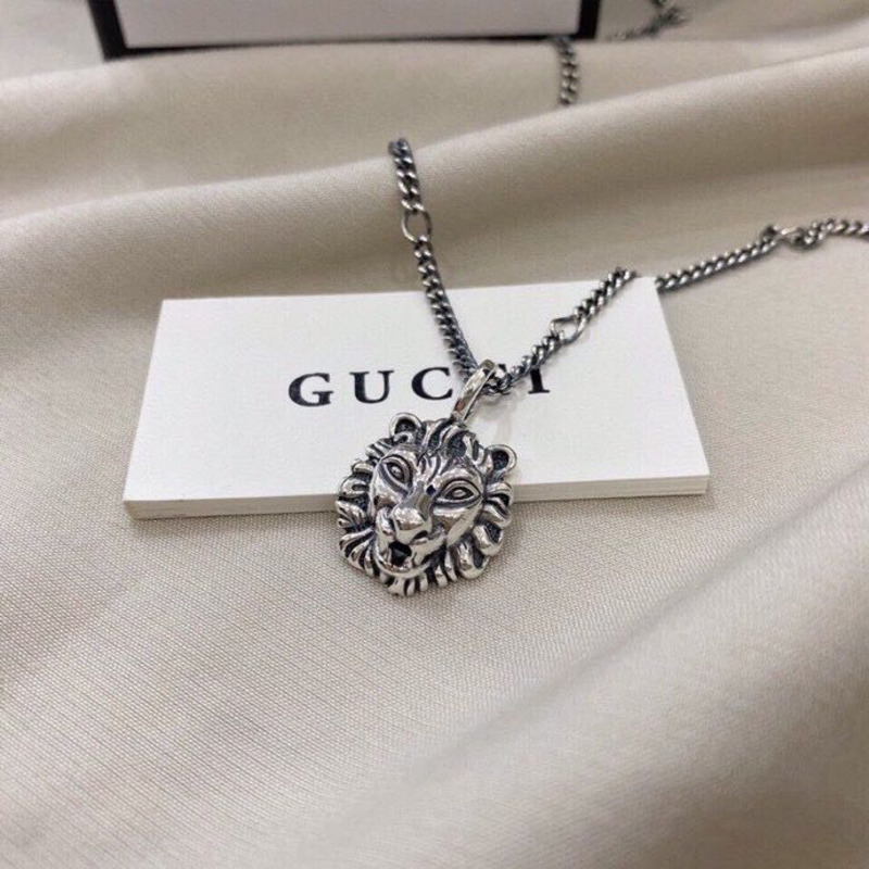 G*u*i 925 sterling silver lion head pendant