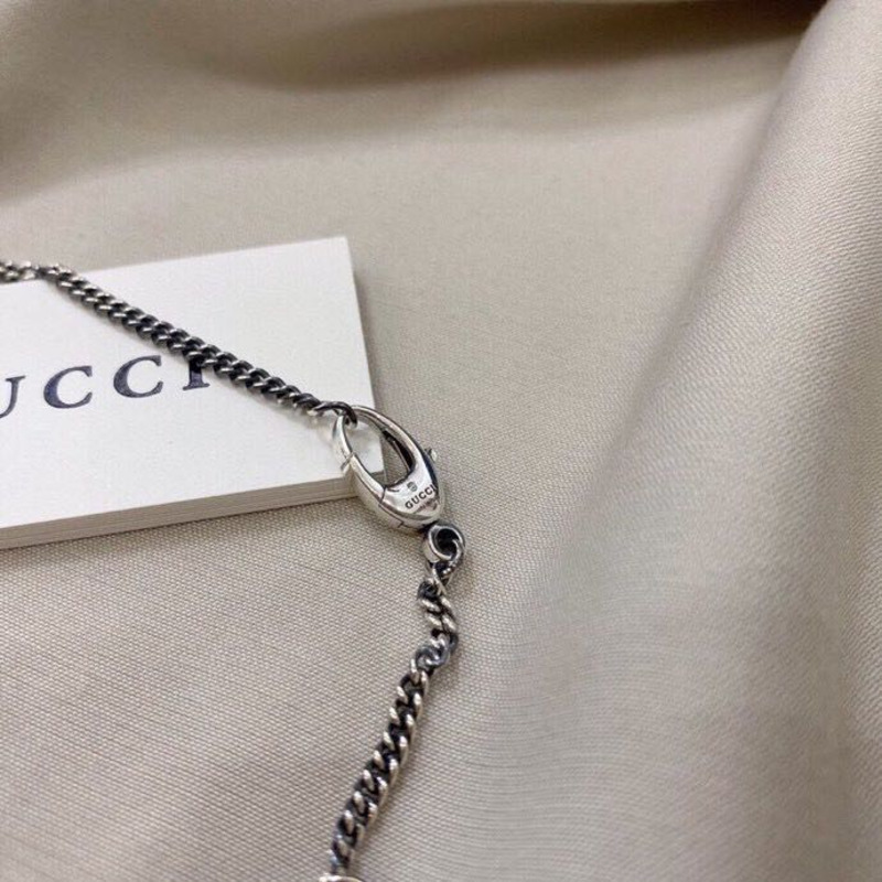 G*u*i 925 sterling silver lion head pendant