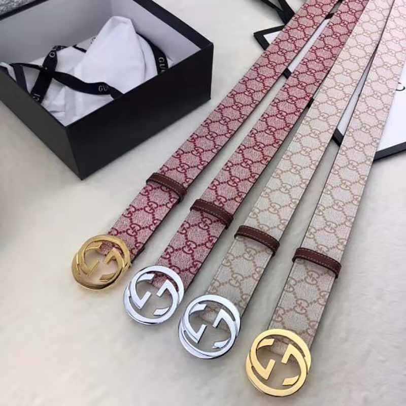 G*u*i belt with silver buckle