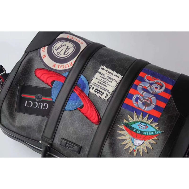 courrier G*u*i suitcase