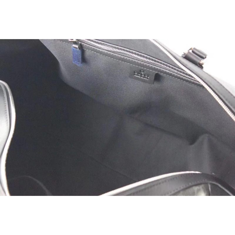 courrier G*u*i suitcase