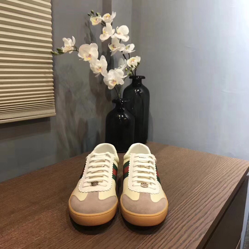 G*u*i leather and suede web sneaker