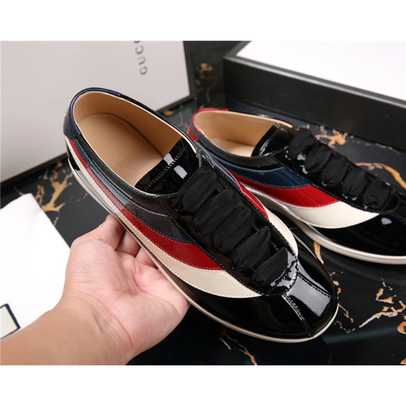 G*u*i patent leather low-top sneakers with web
