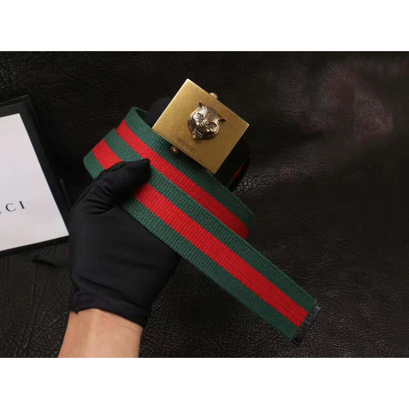 G*u*i canvas web green belt with feline head