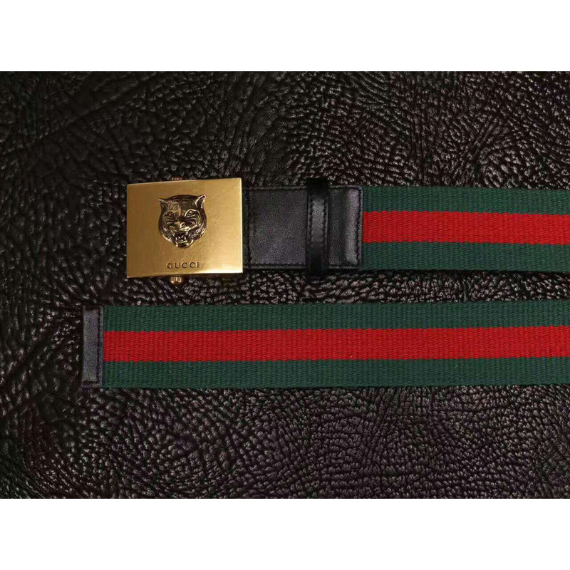 G*u*i canvas web green belt with feline head