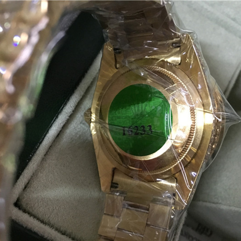 high quality rolex day-date Di*m*nd bezel and red Di*m*nd watch